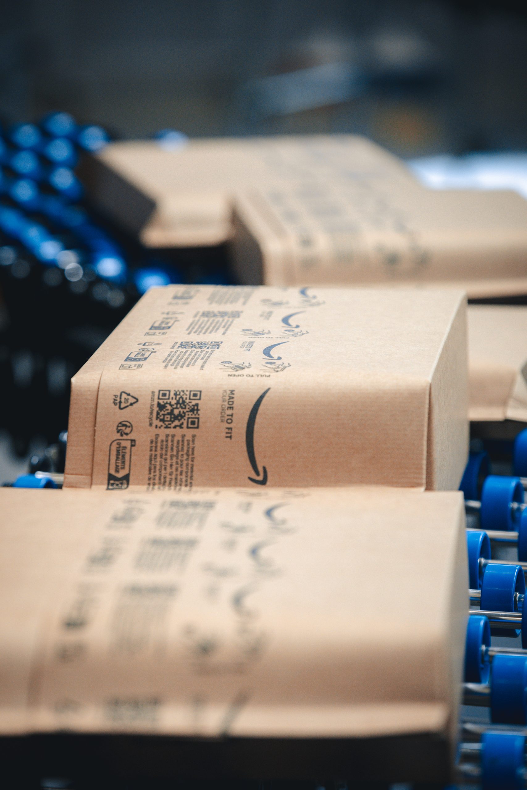 Right-sized paper packages moving along an automated conveyor